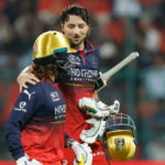 Tim David and Rajat Patidar of Royal Challengers Bengaluru celebrate their record-breaking unbeaten 99-run partnership against Chennai Super Kings at M. Chinnaswamy Stadium.