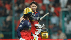Tim David and Rajat Patidar of Royal Challengers Bengaluru celebrate their record-breaking unbeaten 99-run partnership aga...
