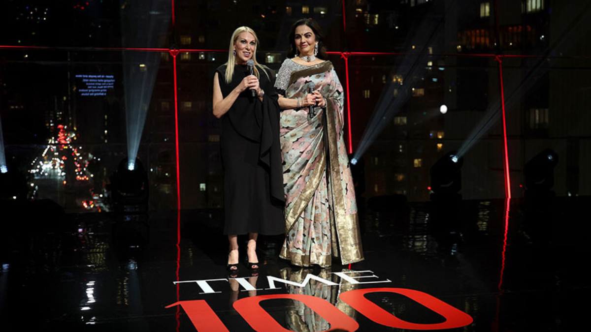 Jessica Sibley and Nita Ambani on the TIME 100 stage announcing the first India edition of the franchise.
