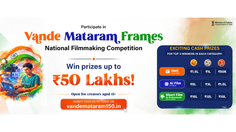 Young man editing on a laptop with a DSLR camera and a prize table for the VM Frames Indian filmmaking contest.