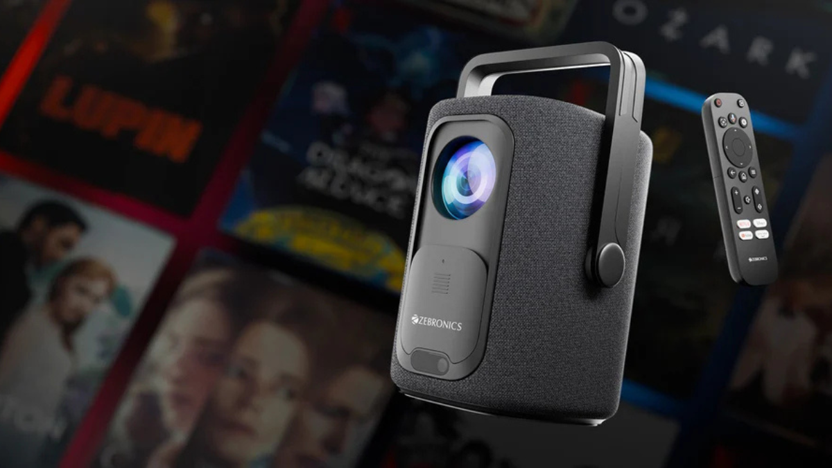 Zebronics ZEB-PixaPlay 77G Smart Projector with remote and a background of streaming shows.
