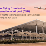 Modern Noida International Airport terminal render with Akasa Air plane in the sky with launch announcement text.