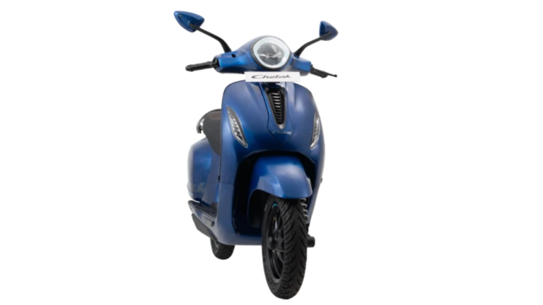 Front view of a matte blue Bajaj Chetak electric scooter with a round LED headlight for the new India C Series launch.