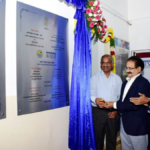 Dr. M. Ravichandran unveiling a silver plaque for the Urban Aerosol Observatory at SRMIST campus in Chennai, India.