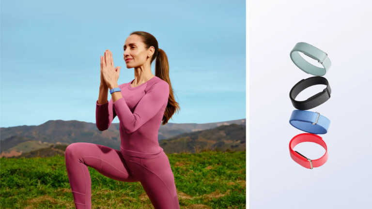 Woman in pink activewear doing yoga outdoors wearing a blue Fitbit Air pebble with a Performance Loop band.