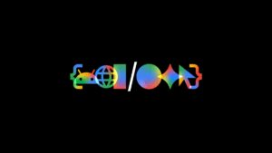 Abstract multi-coloured icons including Android and a browser globe enclosed in code brackets for the AI keynote event.