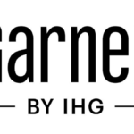 Black logo text reading Garner BY IHG on a white background, representing the brand's new hotel launch in Chhattisgarh