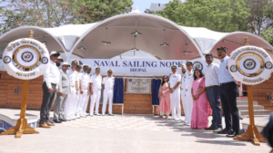 Indian Navy officers and guests stand before the new Naval Sailing Node inauguration plaque at Upper Lake in Bhopal.