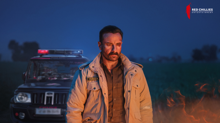 Saif Ali Khan as a bruised officer in a field at night, standing before a police jeep in Kartavya.