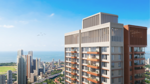 High-rise residential tower with orange balconies overlooking the Mahalaxmi Racecourse and Mumbai sea at BeaconHill