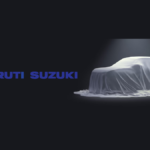 Draped vehicle under a spotlight next to a Maruti Suzuki logo on a dark background, signifying the design challenge for In...