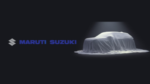 Draped vehicle under a spotlight next to a Maruti Suzuki logo on a dark background, signifying the design challenge for In...