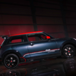 Legend Grey MINI Cooper S with red roof and GP Inspired decals in a dark garage, representing the 30-unit India launch.