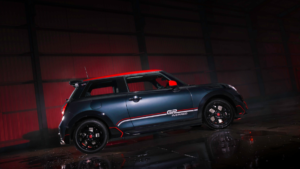 Legend Grey MINI Cooper S with red roof and GP Inspired decals in a dark garage, representing the 30-unit India launch.