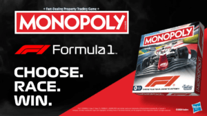 Monopoly Formula One Edition board game box showing an F1 racing car on a red and black track backdrop.