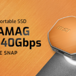 Octagonal copper MSI DATAMAG LITE SSD with a glowing magnetic ring on an orange metallic background for India.