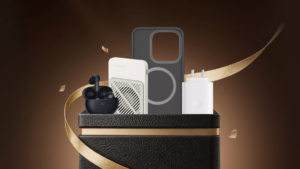 A premium black gift box holding OPPO earbuds, a cooling power bank, a dark phone case, and an Indian wall charger.