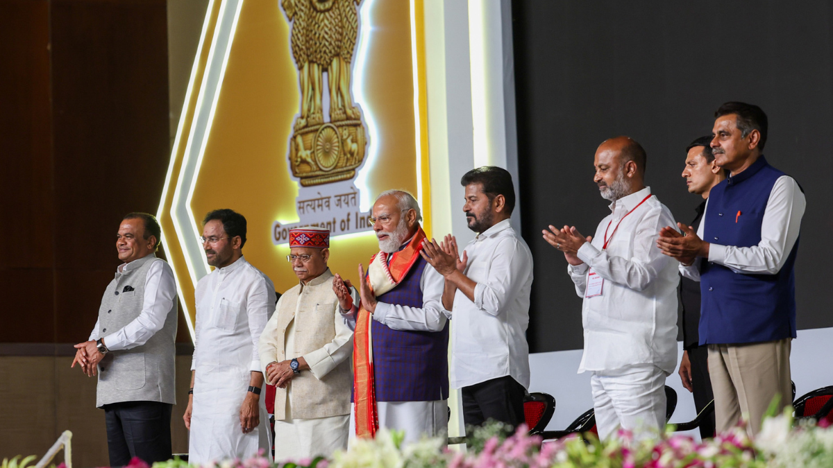 Warangal's new textile hub targets 24,400 jobs 1 PM Narendra Modi with officials on stage at the PM MITRA Park inauguration event in Warangal Telangana.