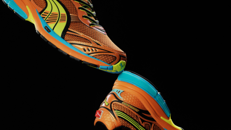 PUMA Homura runner in orange and yellow with PUMALITE cushioning and turquoise accents on a black background.