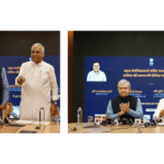 Ashwini Vaishnaw and Bhupender Yadav at a desk with microphones during the Sahasra semiconductor launch.