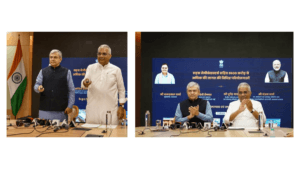 Ashwini Vaishnaw and Bhupender Yadav at a desk with microphones during the Sahasra semiconductor launch.