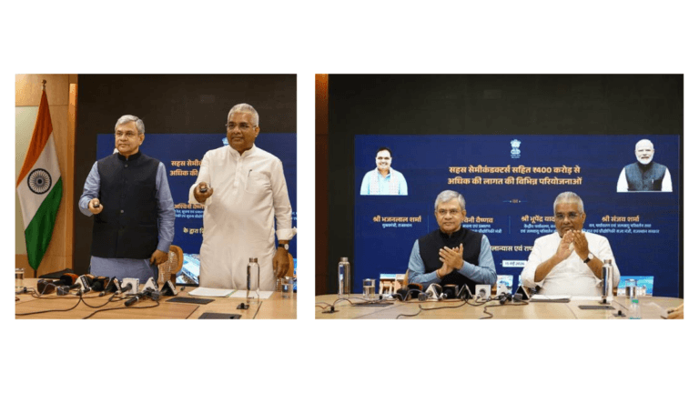 Ashwini Vaishnaw and Bhupender Yadav at a desk with microphones during the Sahasra semiconductor launch.