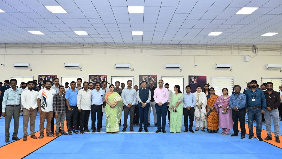 India has a new nodal hub for elite para sports training 2 Sports Authority of India officials and coaches standing together on a blue and orange sports mat during an inauguration event.