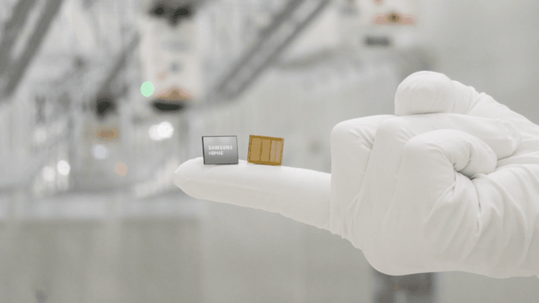 A white gloved hand holding two Samsung HBM4E memory chips showing top and bottom details for India datacentres.