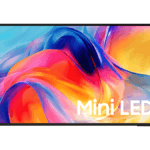 Slim black bezel TV displaying vibrant swirling colours and the words Mini LED for the Samsung India launch.