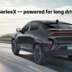 Rear view of a black Tata Curvv.ev SeriesX driving on a highway with a 502 km range text overlay in India.