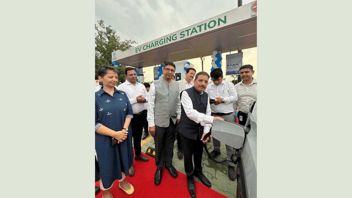 The corridor making cross-country EVs fully practical? 1 Officials inaugurating a Tata Power ultra-fast EV charging station by plugging a charger into an electric car in India.