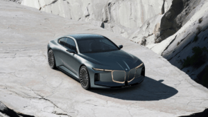 Grey Vision BMW ALPINA coupé on a light rocky quarry ledge, previewing its global luxury design framework.