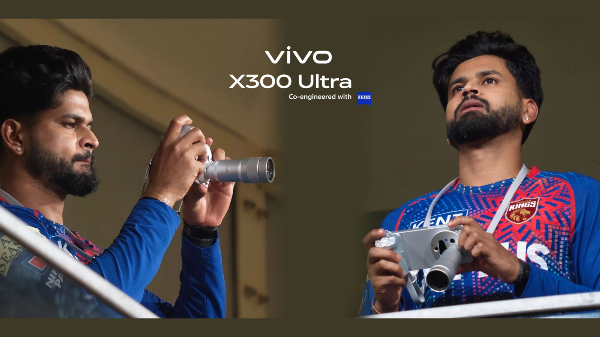 A prominent Indian sportsman on the left and right uses the phone with a silver telephoto lens at a stadium.