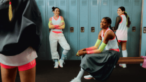 Four athletes in an adidas locker room wearing volleyball gear with the new Crazyflight 7 shoe.