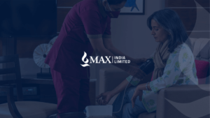 A nurse in a uniform checks the blood pressure of an elderly woman seated on a couch, showing Antara senior care.