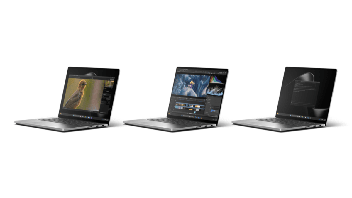 The hardware leap that changes local AI processing forever 3 Three silver laptops showing a photo editing app, a video timeline, and a coding window against a white background.