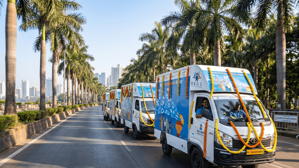 Dell's solar skill vans bring AI training to five states 1 White skill vans with marigold garlands drive on a palm-lined road for the Dell digital skilling launch in India.