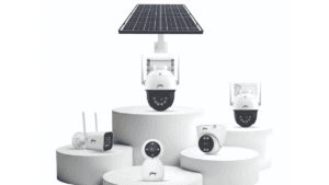 Godrej smart security cameras and a solar panel arranged on white cylindrical podiums highlighting Indian BIS-ER compliance.