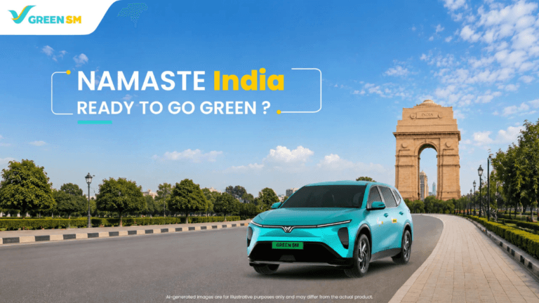 At a 50 percent discount, this EV cab fixes daily commutes 3 Cyan-green VinFast electric car on an empty road in front of India Gate under a blue sky in Delhi.