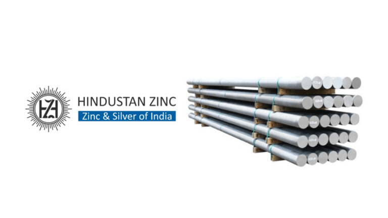 The MoU that could secure India's downstream zinc supply 2 Hindustan Zinc logo next to a stacked pile of cylindrical metal bars on wooden pallets for Rajasthan industrial launch.