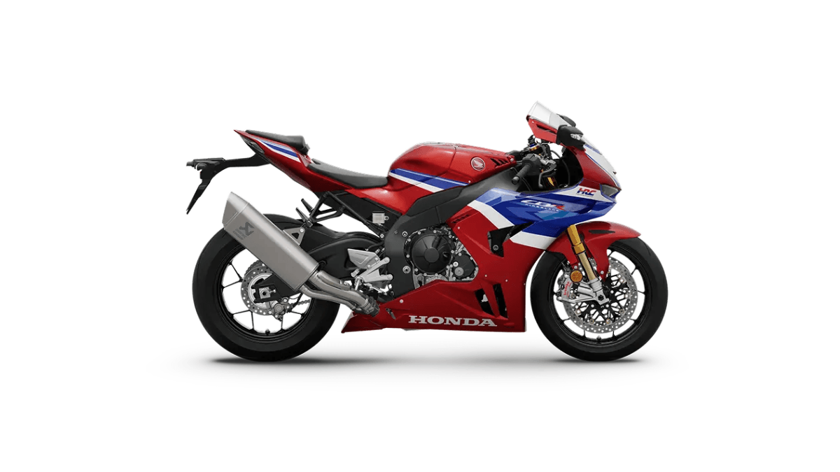 Side profile of a red Honda Fireblade SP showing the Akrapovic titanium exhaust and Brembo brakes.