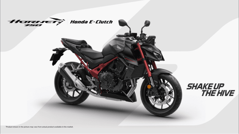 At ₹10.49 lakh, Honda brings its stall-proof tech to India 4 Matte black Honda Hornet 750 motorcycle with red frame and forks against a banner background showcasing E-Clutch tech.