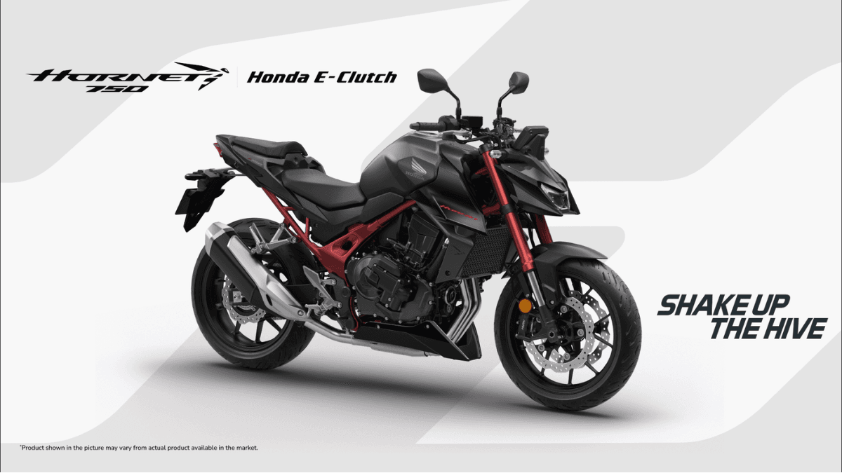 At ₹10.49 lakh, Honda brings its stall-proof tech to India 1 Matte black Honda Hornet 750 motorcycle with red frame and forks against a banner background showcasing E-Clutch tech.
