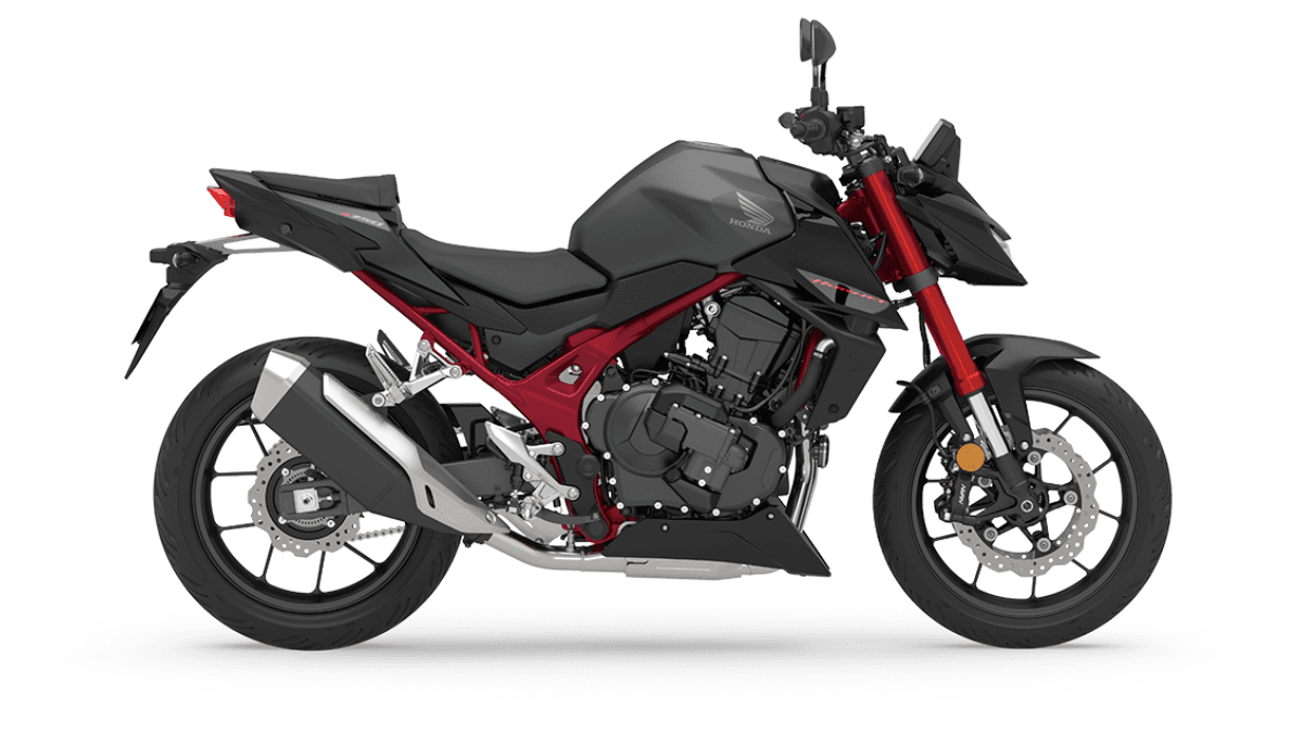 At ₹10.49 lakh, Honda brings its stall-proof tech to India 2 Side profile of a matte black Honda Hornet 750 motorcycle with a red diamond steel frame against a white background.