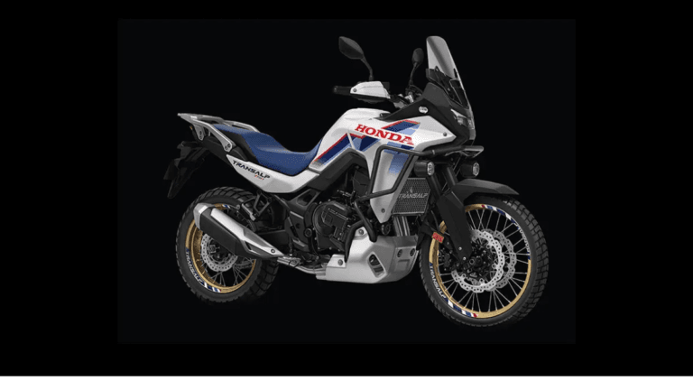 The end of left-hand fatigue in heavy Bengaluru traffic 3 Honda XL750 Transalp motorcycle in tricolour livery with gold spoked wheels on a black background, coming to India.