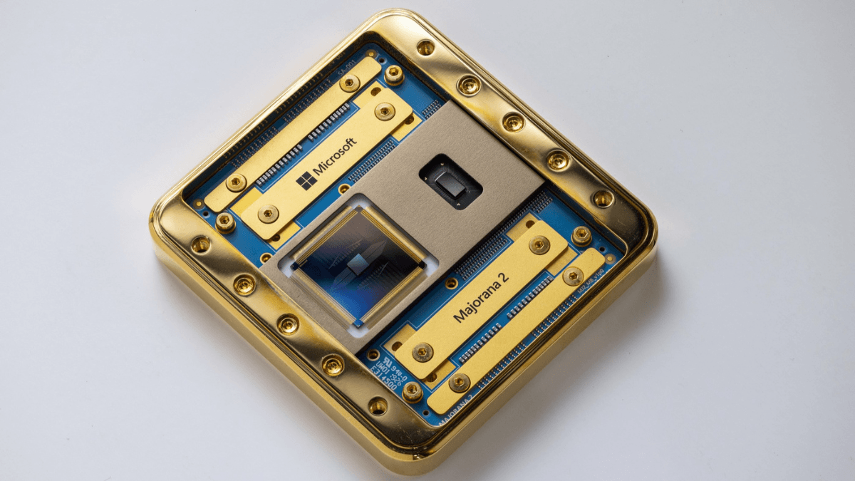 Microsoft's new quantum chip is 1,000 times more reliable 2 A detailed overhead shot of the Microsoft Majorana 2 quantum processor on a white surface, showcasing advanced chip design.
