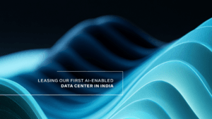Abstract blue and teal wavy digital patterns with text regarding the Meta AI data centre in India.
