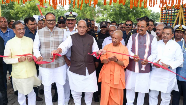 Rajnath Singh and Yogi Adityanath cutting a red ribbon under marigold garlands at the Lucknow museum inauguration.