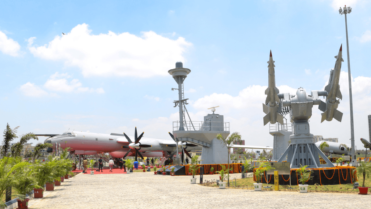 Is Lucknow's new naval open-air museum worth a weekend trip? 1 A grey military aircraft and missile launchers displayed along paved paths inside the Lucknow naval park grounds.