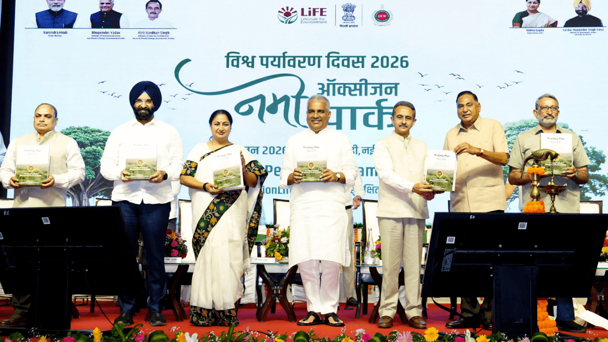 Delhi gets 18 new oxygen parks and a 15 lakh tree target 1 Officials on stage holding the Working Plan at a Delhi park launch.